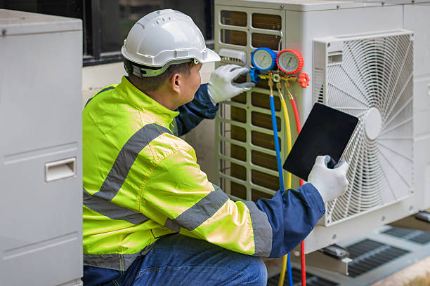 Professional Heat Pump Repair technician working in Groveton, VA